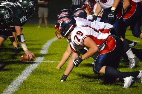 Defensive end Noah Wingerd is ready before the snap against Holy Family.