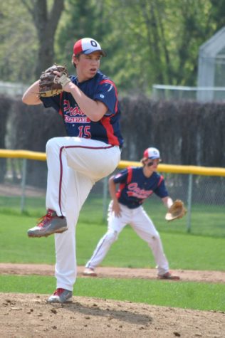 Junior Jake Hartman winds up to throw a strike