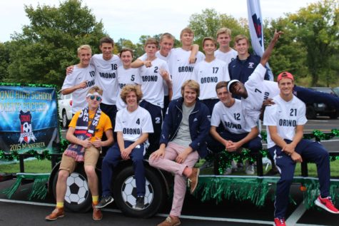 The soccer boys were all smiles when getting ready on their float