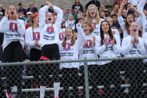 The swimming girls give their captains a cheer