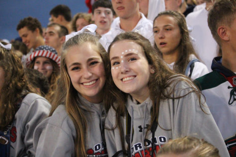 Senior ladies Jaedyn Freshwater (left) and Mackenzie Flynn (right) smile for the camera.