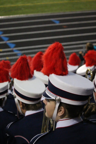 OHS band members await their next time to play at the Homecoming football game.