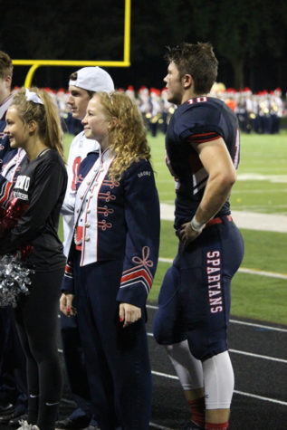 Homecoming court on the track at halftime.