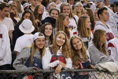 The senior ladies captured in the front row of the Homecoming football game. 