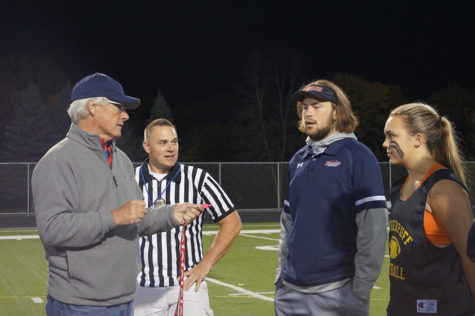 Teacher Doug Erickson explains the rules pregame. 