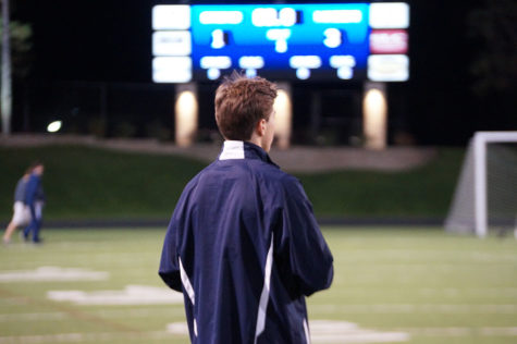 Head coach for the senior team Drew Eiss watches his team. 