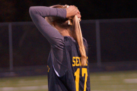 Both teams came with lots of spirit sporting eyeblack in their respective colors and ribbons in their hair. 