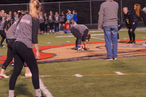 Junior Mara Holm snaps the ball to her teammates. 