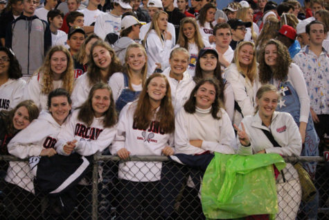 Senior ladies wear their white to be a part of the dress up theme on Homecoming night. 