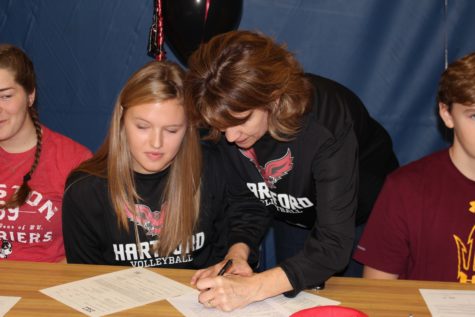 Senior Megan Anderson's mom signs her letter of intent