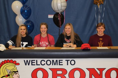 Seniors Tori Andrew, Sam Fischer, Megan Anderson, and Will Brenton pose for a picture before signing their letters