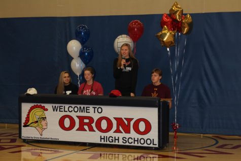 Senior Megan Anderson says a few words before she signs her letter to Harding University