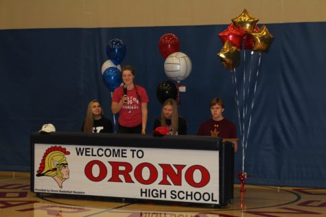 Senior Sam Fischer says a few words before she signs her letter of intent with Boston University for Rowing